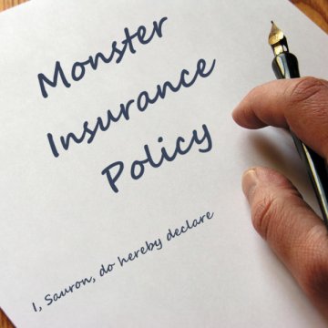 An unknown hand writes out a 'monster insurance policy' for Sauron.