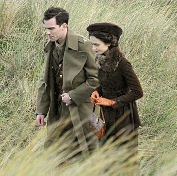 A picture of Nicholas Hoult and Lily Collins from the movie 'Tolkien'.